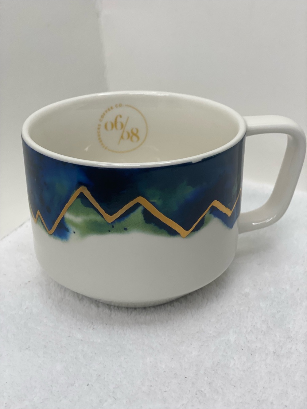 Starbucks 2015 Artisan Series 06/08 12 ounce Coffee Mug Mountain Design Gold RIm